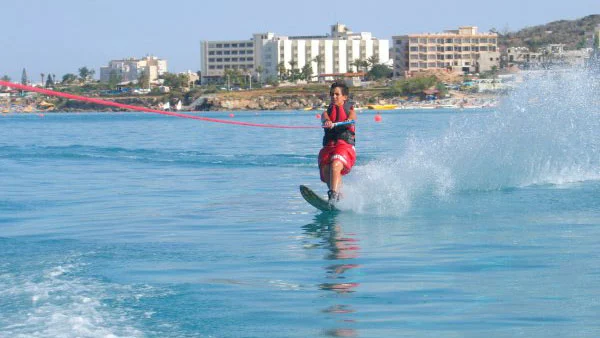 Girl doing surf-boarding image.